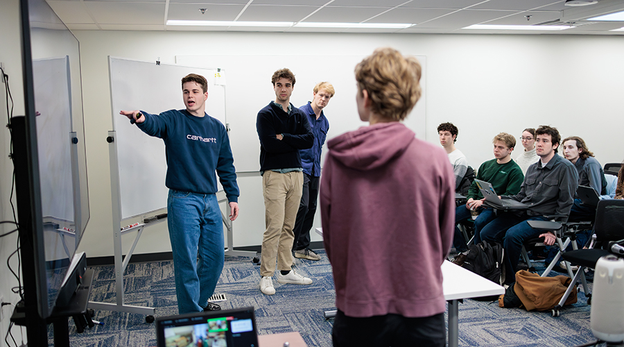 Students present for an Engineering Design capstone course