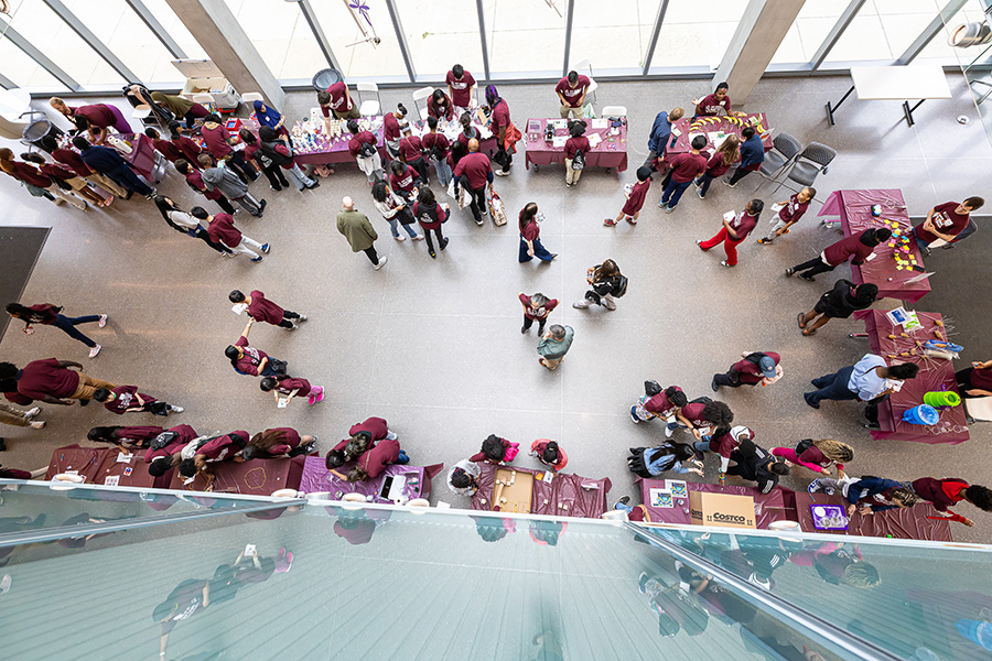 Students interact with science demos