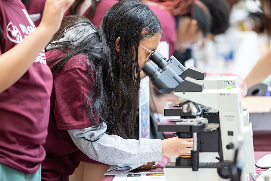 Students interact with science demos