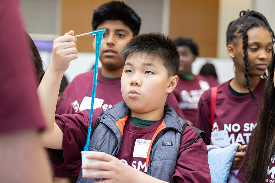 Students interact with science demos