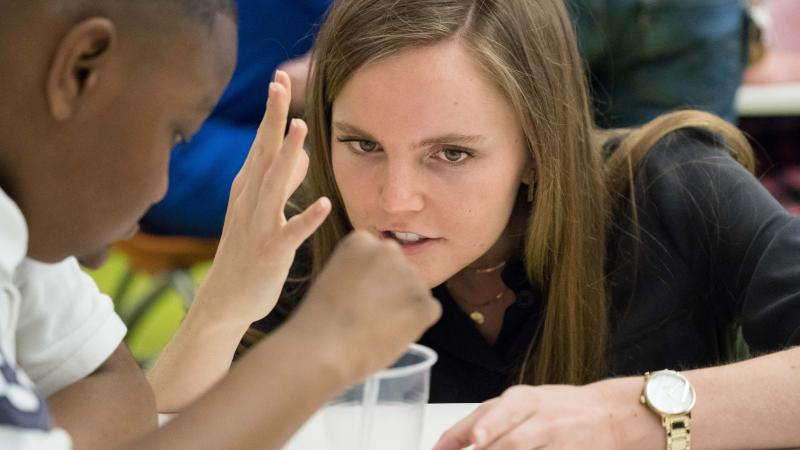 Graduate student Rachel Weathered leading a Junior Science Cafe