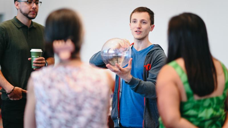 UChicago Pritzker School of Molecular Engineering Quantum Educational Laboratory Instructor Danyel Cavazos gives demonstration to group of high school teachers