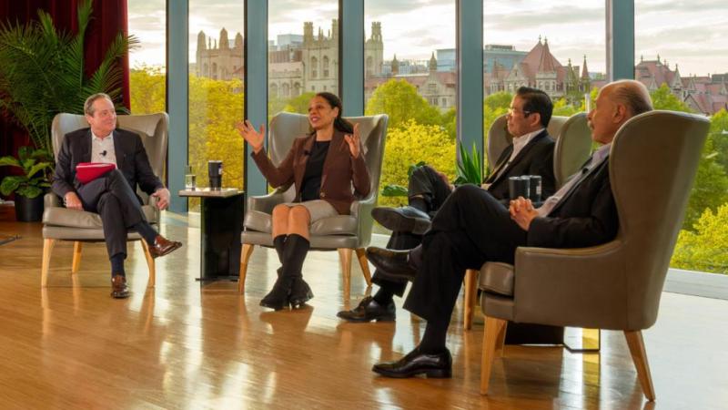 Four people sitting in a semi-circle