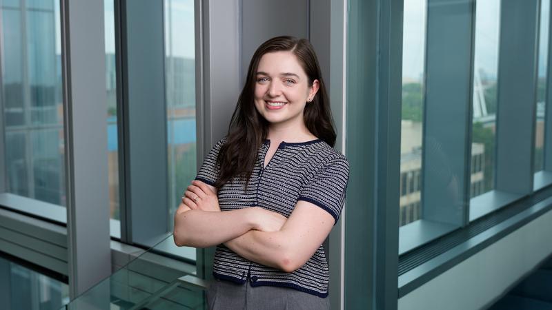 Kaitlyn Adams in front of window