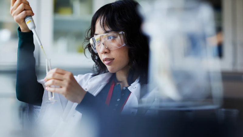 Woman with pipette