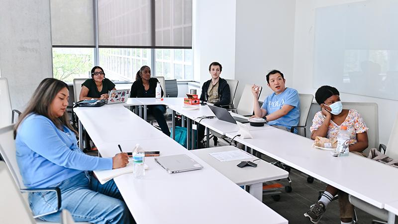 Instructors sitting at table
