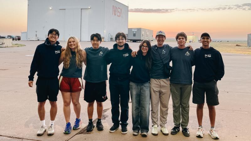 Group shot of eight people