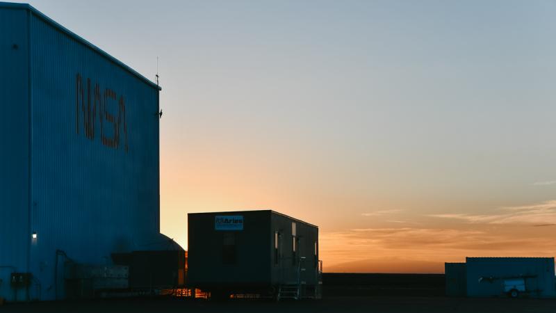 Sunrise over a series of trucks