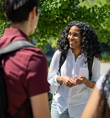 Students chatting in courtyard