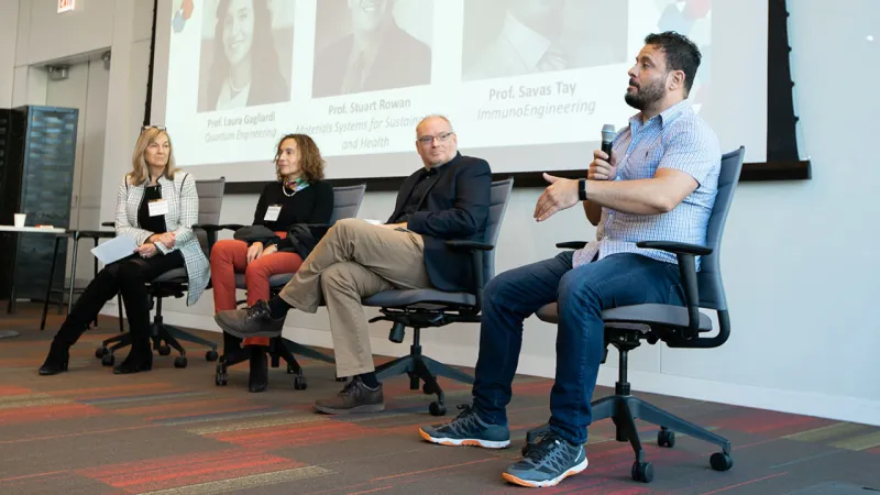 Three faculty members and a moderator