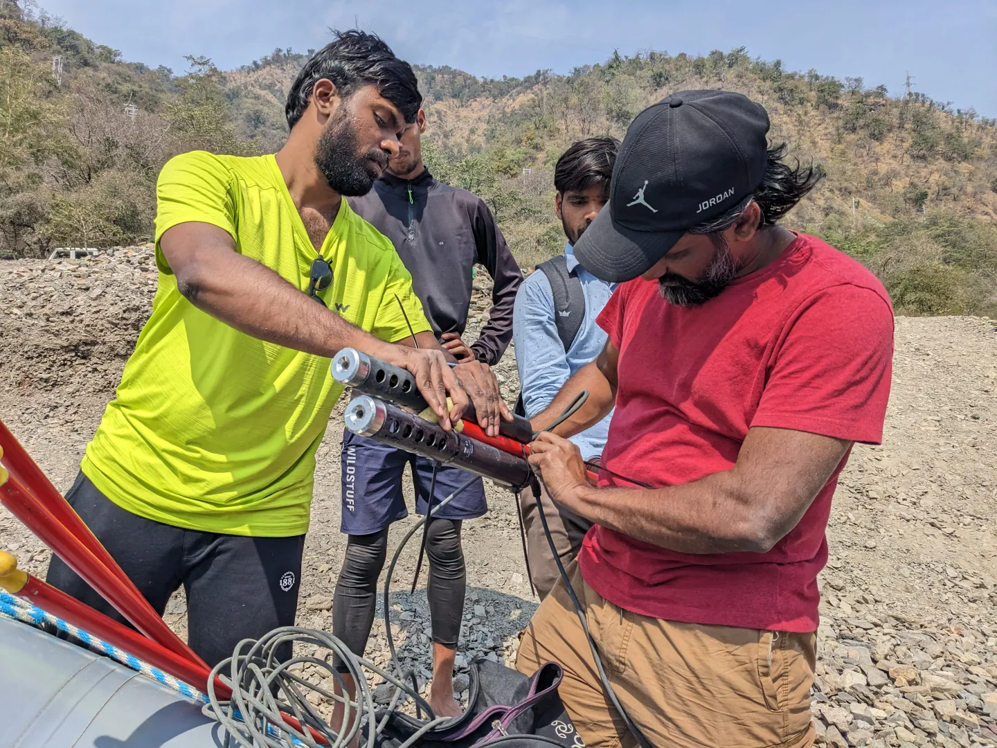 Researchers in India taking water quality measurements with mobile sensors developed at the University of Chicago's Pritzker School of Molecular Engineering