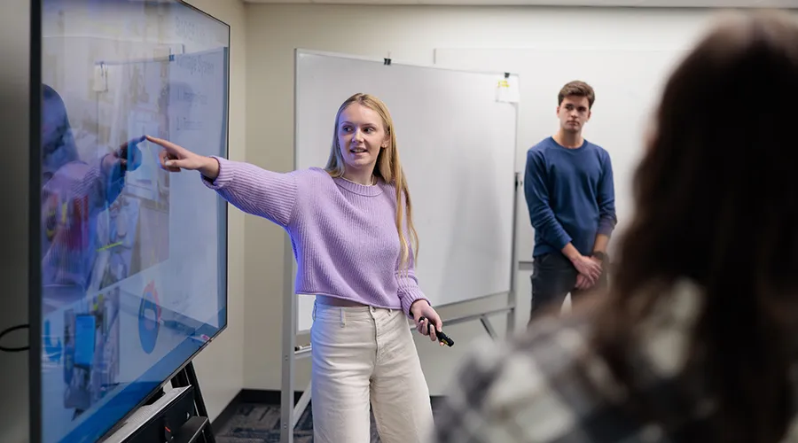 Students present for an Engineering Design capstone course