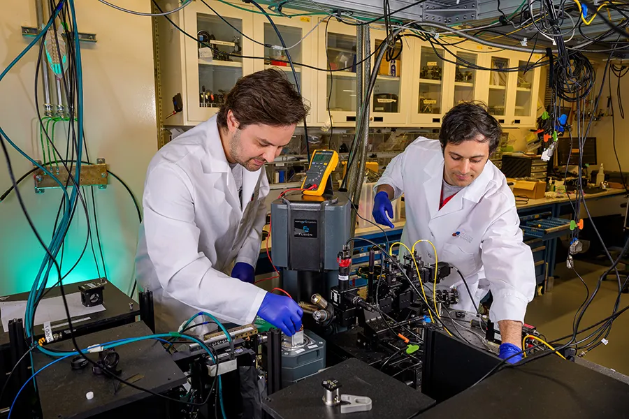 Two UChicago Pritzker School of Molecular Engineering researchers in the lab