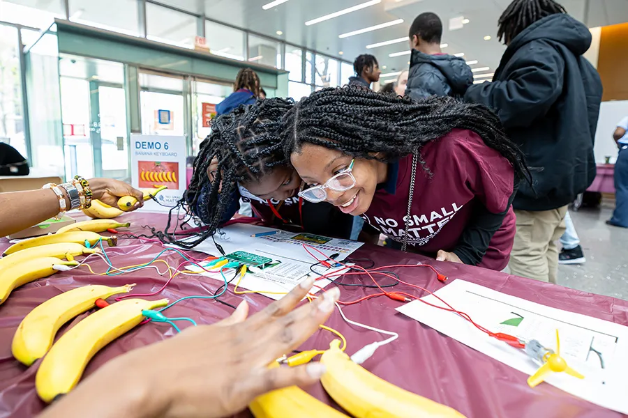 Students with a banana demo