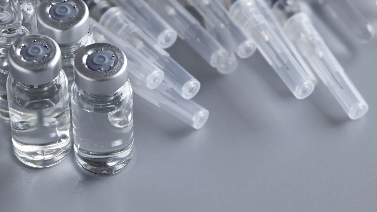Stock photo of vaccines vials and syringes
