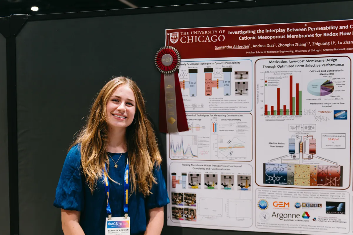 Presenter poses with poster