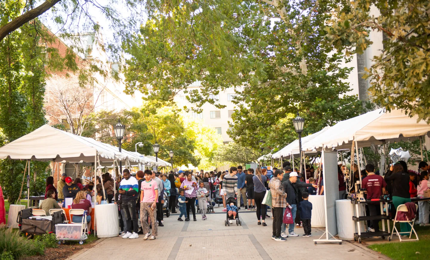 View of South Side Science Festival tents and attendees on University of Chicago campus